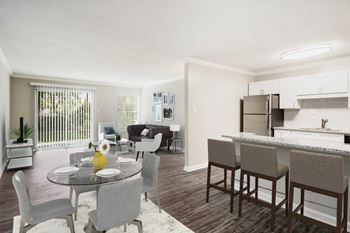 our apartments offer a living room with a dining area and a kitchen